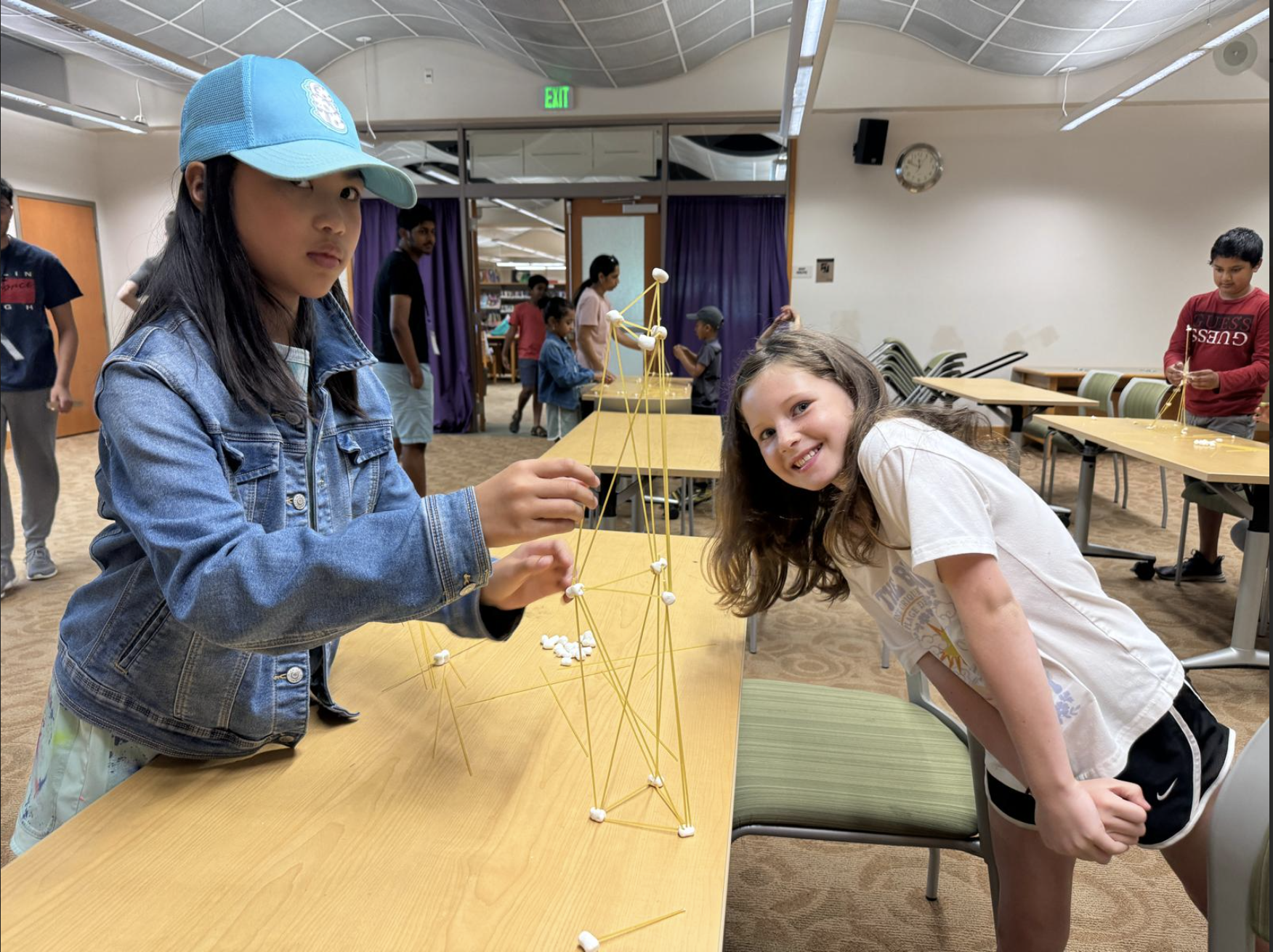 Students building marshmallow tower engineering challenge